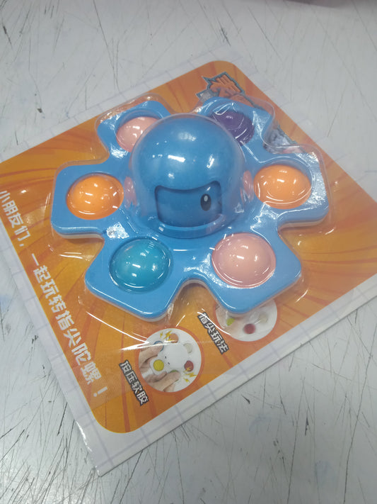 Spinner with pop-it
